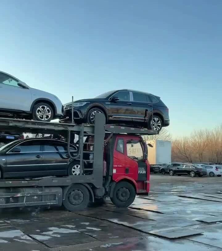 異地拖車1000公里價格小轎車是多少錢？北京到哈爾濱汽車托運收費標準